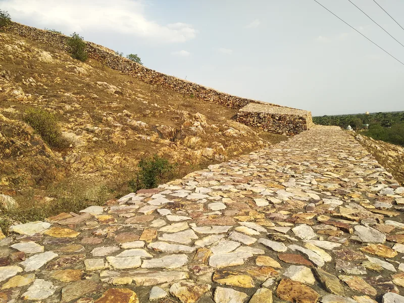 Rājagaha, the old capital of Magadha, today: the ruins of its ancient stone wall at Rajgir.