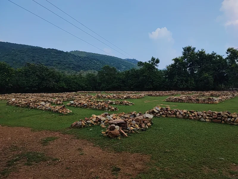 The excavated site of Jīvaka's mango grove at Rajgir, where the Sāmaññaphala Sutta is set.