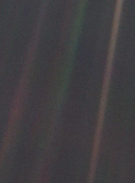 Earth, the "pale blue dot," as Voyager 1 photographed it in 1990.