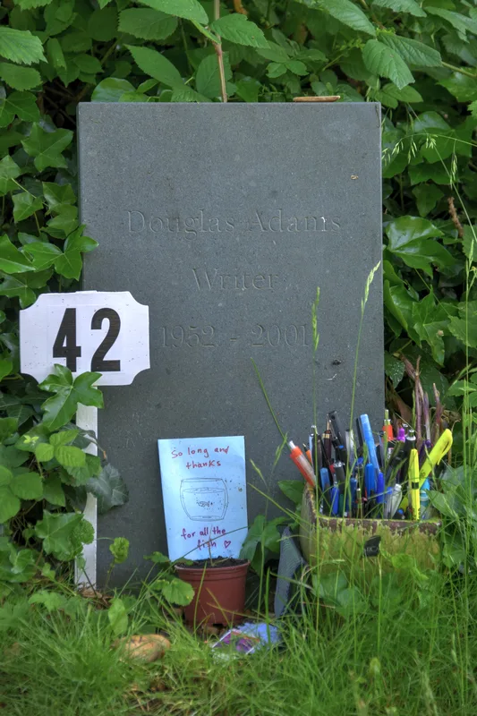 Douglas Adams's grave at Highgate Cemetery, with tributes left by readers, in 2016.