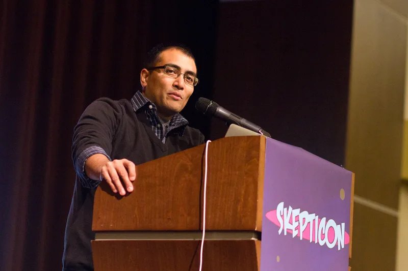 Mehta speaking at Skepticon 7 in 2014.