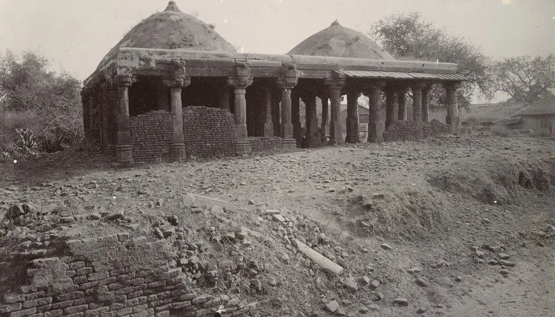 A temple at Dholka, converted into a mosque, photographed in 1885. The one surviving manuscript of the book was copied at Dholka in December 1292.