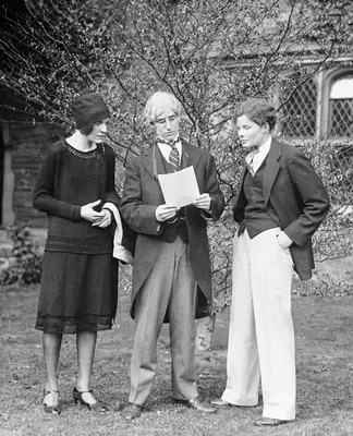 Katharine Hepburn (one of the three figures) in a play at Bryn Mawr College, from the Hartford Courant of April 1927. Which figure is Hepburn is not confirmed.