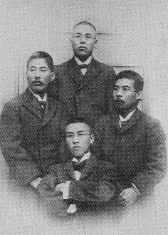 The editors of the Heimin-sha in 1904. By the Commons description Kōtoku is on the left, with Sakai Toshihiko at the top, Nishikawa Kōjirō on the right and Ishikawa Sanshirō at the bottom.