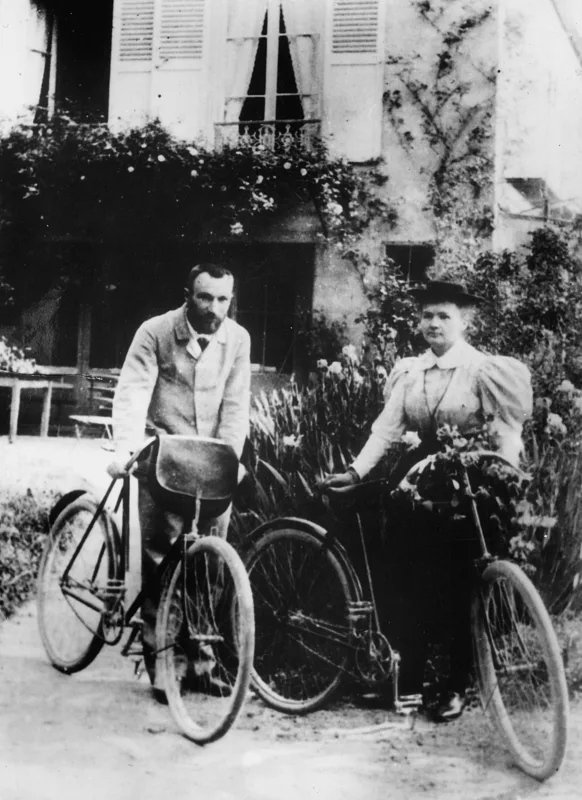 Marie and Pierre Curie with bicycles on their honeymoon, 1895.