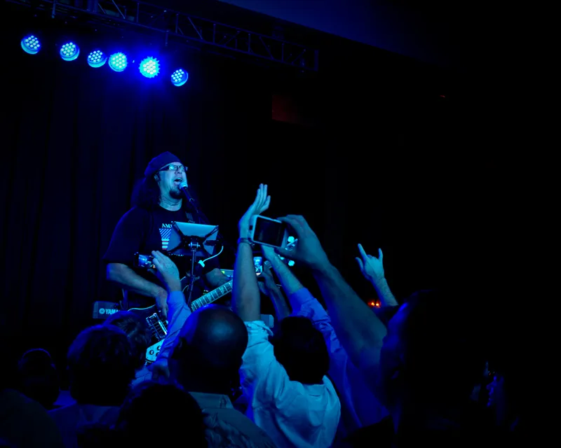 Penn Jillette leading the No God Band at a party during The Amazing Meeting 9, Las Vegas, July 2011.