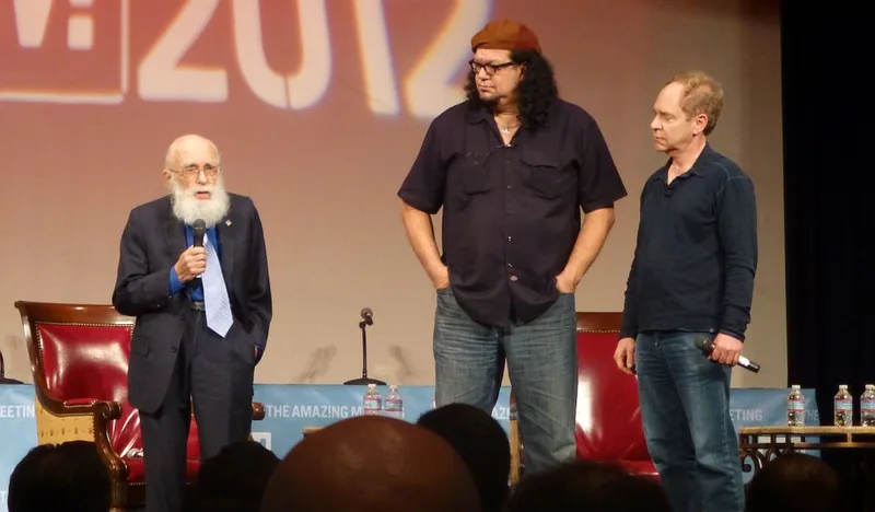 Penn & Teller on stage with James Randi at The Amazing Meeting, July 2012.