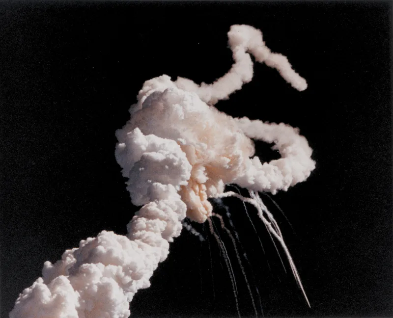 The Challenger breaking apart on 28 January 1986.