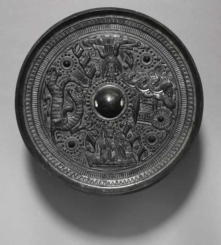 Han tomb art: a mirror with deities, chariot and the White Tiger, Eastern Han, in the Cleveland Museum of Art.